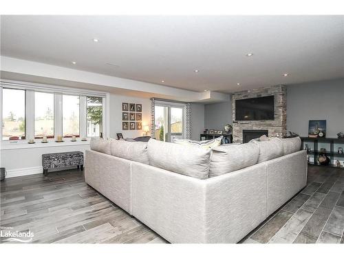 16 Sunset Court, Wasaga Beach, ON - Indoor Photo Showing Living Room With Fireplace