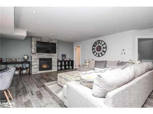 16 Sunset Court, Wasaga Beach, ON - Indoor Photo Showing Living Room With Fireplace