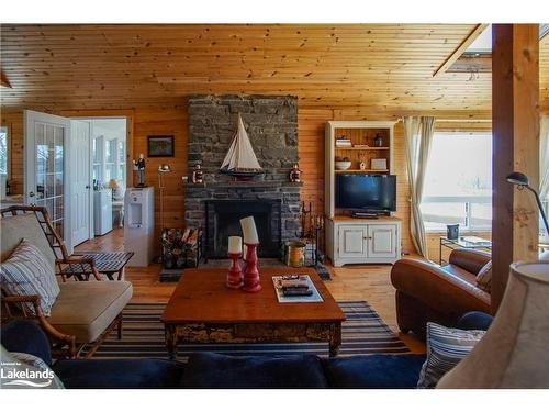 2 Island 130, Port Severn, ON - Indoor Photo Showing Living Room With Fireplace