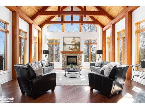 1016 Lawland Heights Road, Gravenhurst, ON - Indoor Photo Showing Living Room With Fireplace