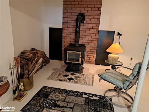 99 Bridgedale Crescent, Port Sydney, ON - Indoor With Fireplace