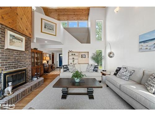 57 Bernard Crescent, Sundridge, ON - Indoor Photo Showing Living Room With Fireplace
