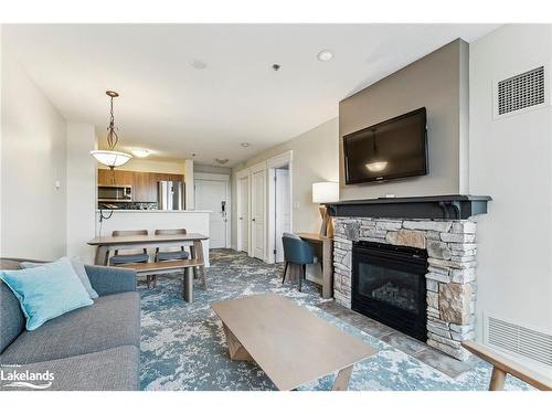 317-170 Jozo Weider Boulevard, The Blue Mountains, ON - Indoor Photo Showing Living Room With Fireplace