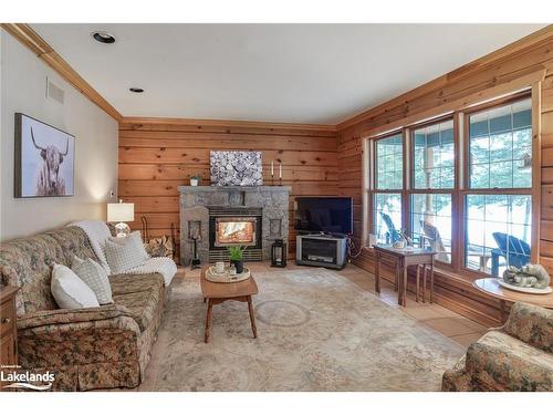 1078 North Drive, Minett, ON - Indoor Photo Showing Living Room With Fireplace