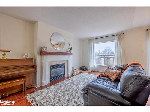 64 Rose Valley Way, Wasaga Beach, ON - Indoor Photo Showing Living Room With Fireplace