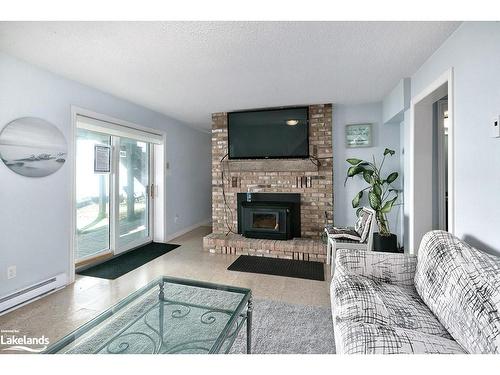 283 Cedar Avenue, Meaford, ON - Indoor Photo Showing Living Room With Fireplace