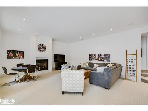39 Estate Drive, Port Carling, ON - Indoor Photo Showing Living Room With Fireplace