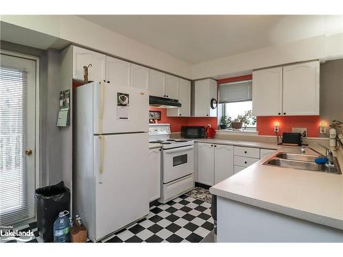 3-10 Mulligan Lane, Wasaga Beach, ON - Indoor Photo Showing Kitchen With Double Sink