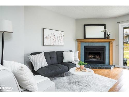 3-162 Settlers Way, The Blue Mountains, ON - Indoor Photo Showing Living Room With Fireplace