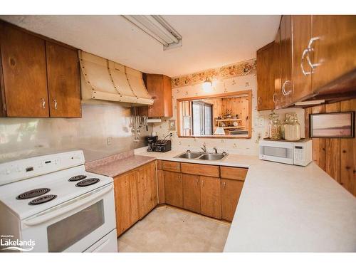 51 Stevens Road, Temagami, ON - Indoor Photo Showing Kitchen With Double Sink