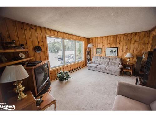 51 Stevens Road, Temagami, ON - Indoor Photo Showing Living Room With Fireplace