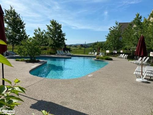 126-125 Fairway Court, The Blue Mountains, ON - Outdoor With In Ground Pool With Backyard