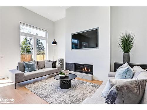 8705 Beachwood Road, Wasaga Beach, ON - Indoor Photo Showing Living Room With Fireplace