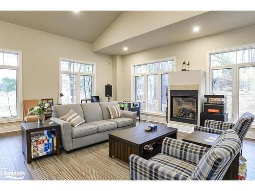 402-391B Manitoba Street, Bracebridge, ON - Indoor Photo Showing Living Room With Fireplace