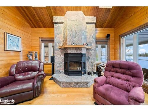 24 Wendy'S Lane, Mckellar, ON - Indoor Photo Showing Living Room With Fireplace