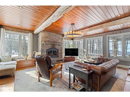 177 Osprey Heights Road, Grey Highlands, ON - Indoor Photo Showing Living Room With Fireplace