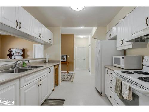 104-333 Lafontaine Road W, Tiny, ON - Indoor Photo Showing Kitchen With Double Sink