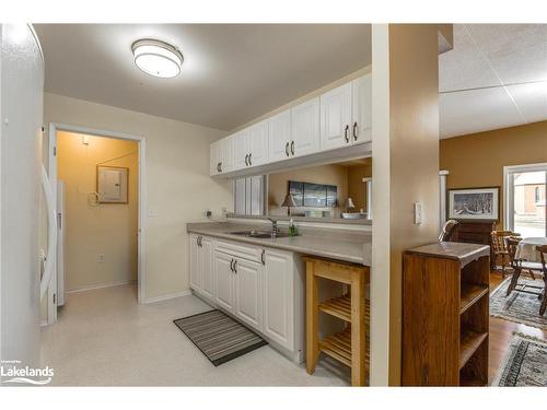 104-333 Lafontaine Road W, Tiny, ON - Indoor Photo Showing Kitchen With Double Sink