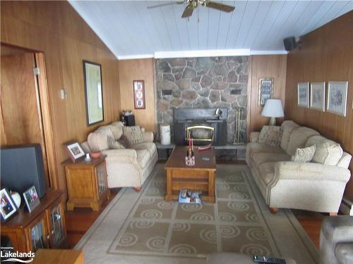 1024 Trillium Drive, Bracebridge, ON - Indoor Photo Showing Living Room With Fireplace