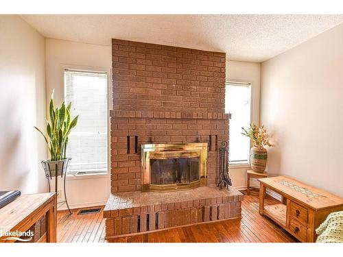 20 Lindsay Crescent, Orillia, ON - Indoor Photo Showing Living Room With Fireplace