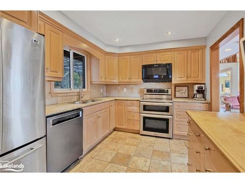 33 Wendake Road, Tiny, ON - Indoor Photo Showing Kitchen With Double Sink