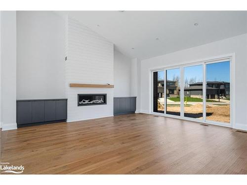 Lot 36 West Ridge Drive, Thornbury, ON - Indoor Photo Showing Living Room With Fireplace