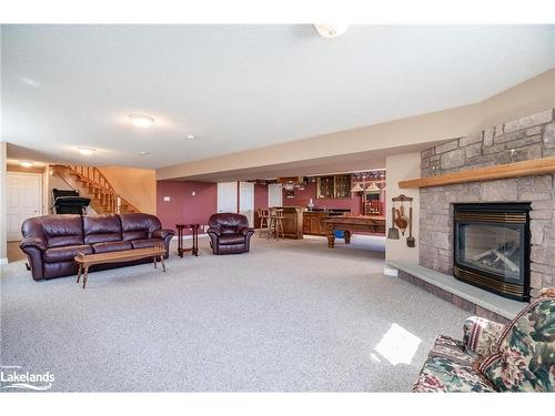 8485 Highway 93, Tiny, ON - Indoor Photo Showing Living Room With Fireplace