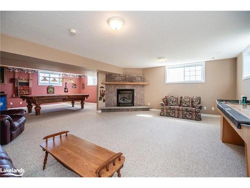 8485 Highway 93, Tiny, ON - Indoor With Fireplace