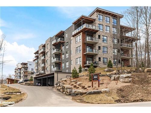 401-18 Campus Trail, Huntsville, ON - Outdoor With Balcony With Facade