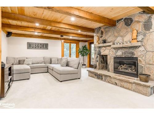 64 Golf Course Road, Bracebridge, ON - Indoor Photo Showing Living Room With Fireplace