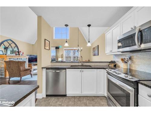 225-170 Snowbridge Way, The Blue Mountains, ON - Indoor Photo Showing Kitchen With Stainless Steel Kitchen
