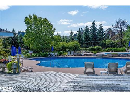 225-170 Snowbridge Way, The Blue Mountains, ON - Outdoor With In Ground Pool With Deck Patio Veranda With Backyard