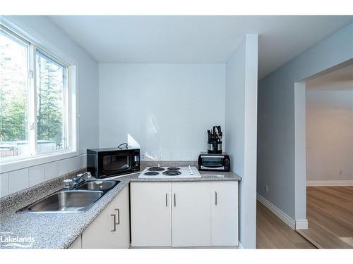 74 Forest Road, Tiny, ON - Indoor Photo Showing Kitchen With Double Sink