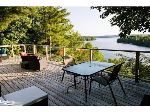 1047 Whyman Road, Algonquin Highlands, ON - Outdoor With Body Of Water With Deck Patio Veranda