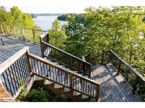 1047 Whyman Road, Algonquin Highlands, ON - Outdoor With Body Of Water With Deck Patio Veranda With Exterior
