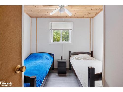 9 Courland Road, Ahmic Harbour, ON - Indoor Photo Showing Bedroom