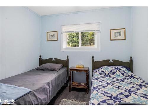 9 Courland Road, Ahmic Harbour, ON - Indoor Photo Showing Bedroom