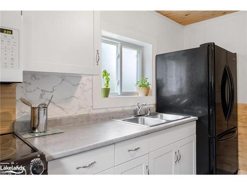 9 Courland Road, Ahmic Harbour, ON - Indoor Photo Showing Kitchen With Double Sink