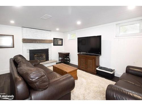 7 Sunset Court, Collingwood, ON - Indoor Photo Showing Living Room With Fireplace