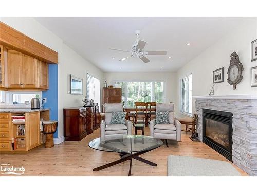 36 Rosemary Road, Tiny, ON - Indoor Photo Showing Living Room With Fireplace