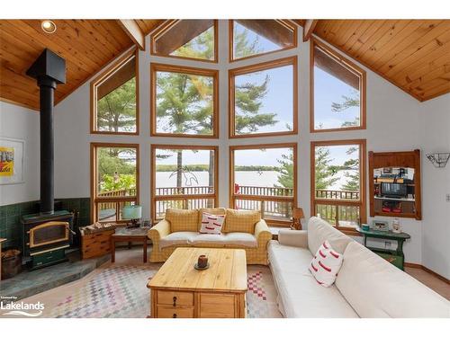 18 Miller Island, Gravenhurst, ON - Indoor Photo Showing Living Room With Fireplace