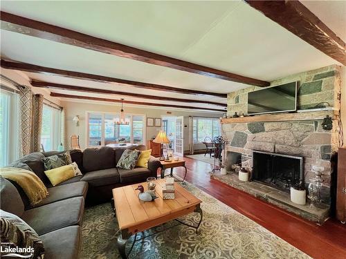 1127 Tondern Island Road, Muskoka Lakes, ON - Indoor Photo Showing Living Room With Fireplace