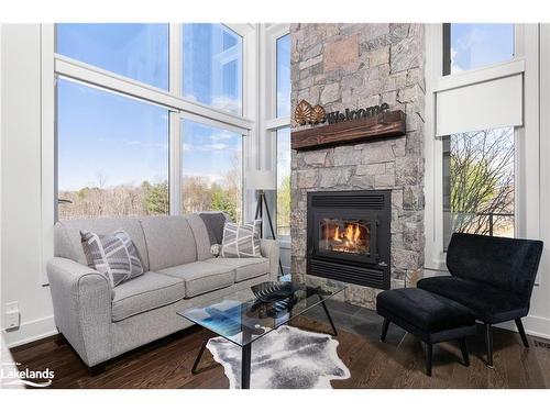 20 Carrick Trail, Gravenhurst, ON - Indoor Photo Showing Living Room With Fireplace