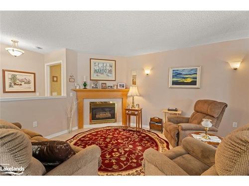 19 Pineridge Gate, Gravenhurst, ON - Indoor Photo Showing Living Room With Fireplace