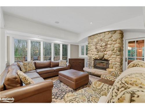 1656 Muskoka Beach Road, Bracebridge, ON - Indoor Photo Showing Living Room With Fireplace