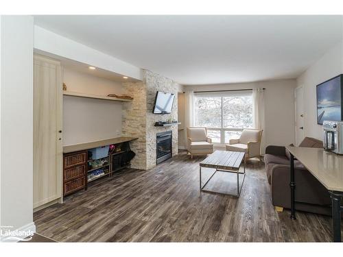 55 - 204-1235 Deerhurst Drive, Huntsville, ON - Indoor Photo Showing Living Room With Fireplace
