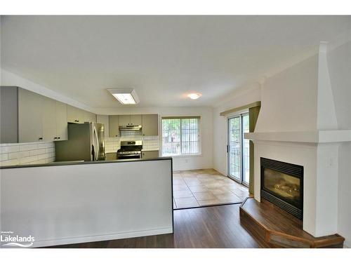 2A Silver Birch Avenue, Wasaga Beach, ON - Indoor With Fireplace
