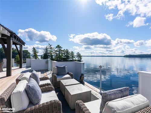 5-1140 Morinus Road, Port Carling, ON - Outdoor With Body Of Water With Deck Patio Veranda