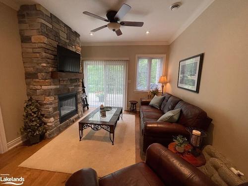 18 Maple Court, Coldwater, ON - Indoor Photo Showing Living Room With Fireplace