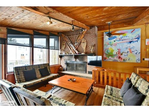 163 Tyrolean Lane, The Blue Mountains, ON - Indoor Photo Showing Living Room With Fireplace